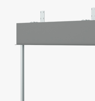 Close-up of a grey metal beam with mounting brackets on top, supported by a vertical steel post.
